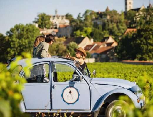driving in the vineyards from Beaune with a 2CV classic car in Burgundy grands crus road tour