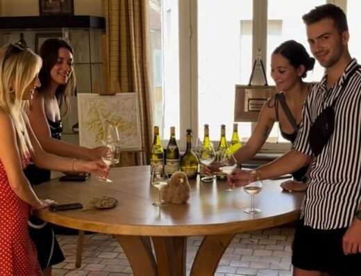 Customers tastig some Chablis white wines in Burgundy wine & cheese tasting trip