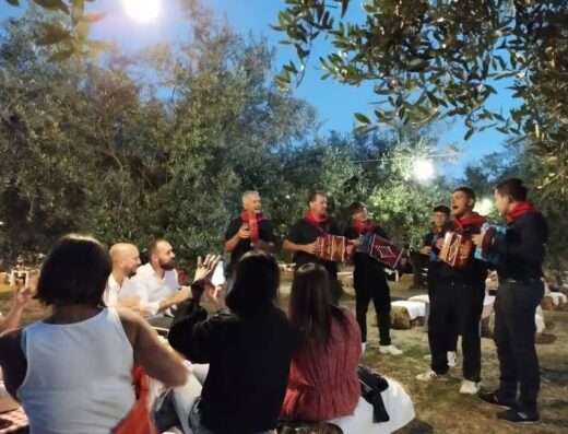 Musicians playing live music under the moonlight at Santa Maria Imbaro Azienda Agricola La Vinarte