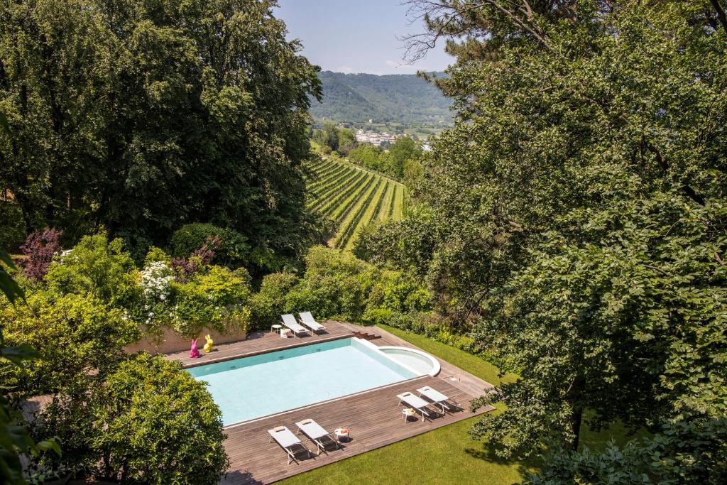 swimming pool in vineyards of franciacorta, in Albereta relais et Chateaux, Erbusco, Lombardy